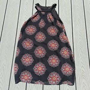 Black dress with flower pattern.